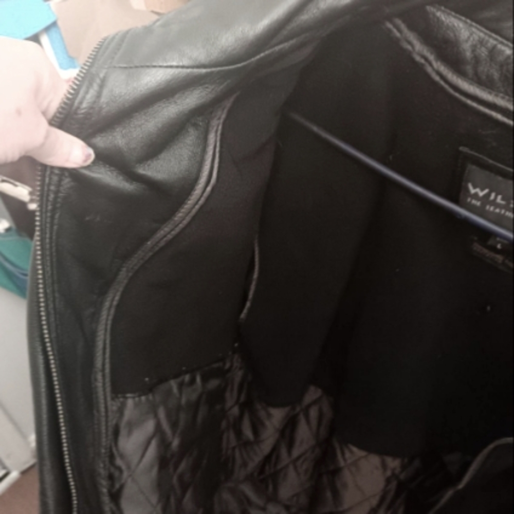 It's a Wilson leather mens jacket barely worn great present for your man warm
